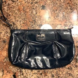 Navy blue patent leather Coach wristlet